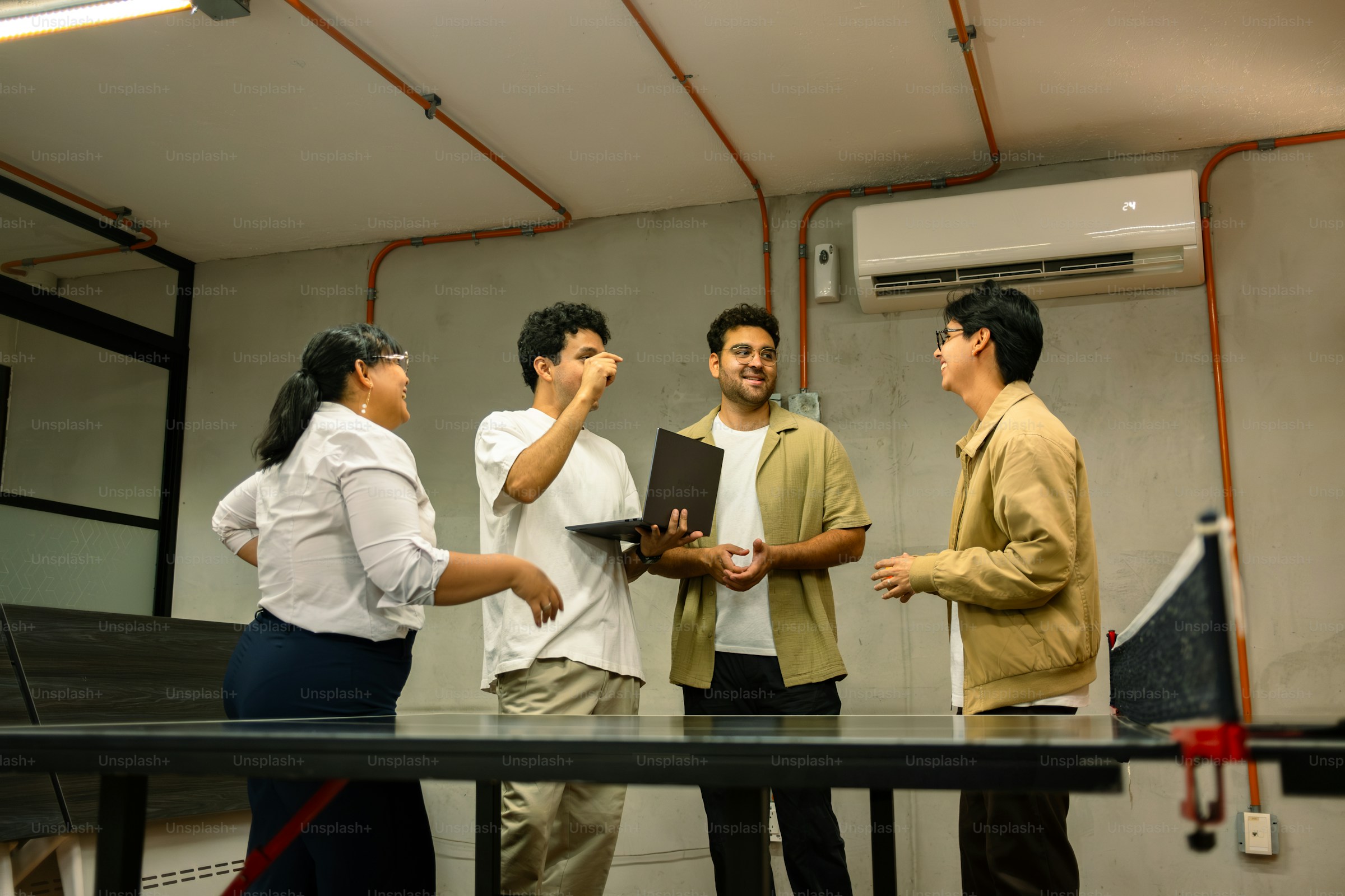 InnCrew team chatting and planning together in the workspace